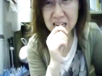 Mature Chinese Lady Teasing In Office