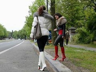 Hooker Waiting A John In Designer Patent Leather Boots