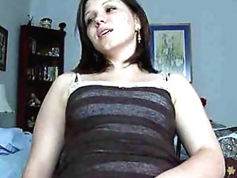 Vulgar Dark Haired Bombshell Rubs Her Pussy On Edge Of Bed